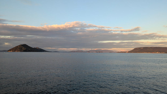 The Seto Inland Sea, late afternoon. We can see some islands.