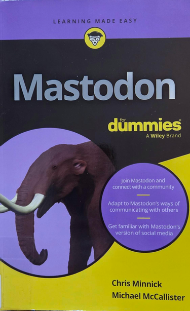 The cover of Mastodon For Dummies by Chris Minnick and Michael McCallister. It uses purple and yellow and depicts a mammoth with tusks.