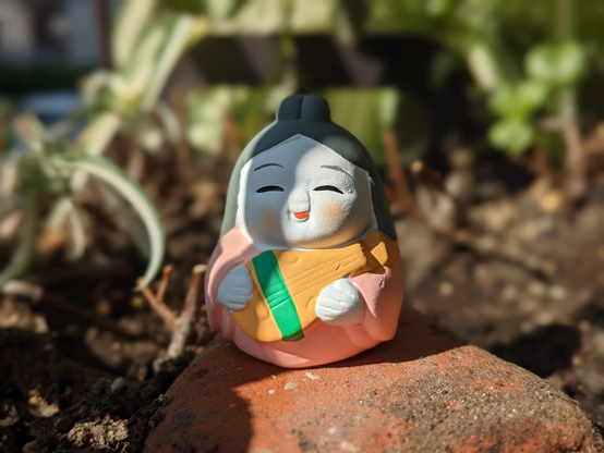 Omikuji (fortune slip) holder in the shape of the goddess Benzaiten.