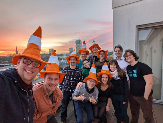 FSFE staffers posing at the Software Freedom Flat terrace