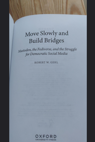the first cover page of the book "Move Slowly and Build Bridges" better readable because black on white. on the bottom you can read "oxford" because its from oxford press.