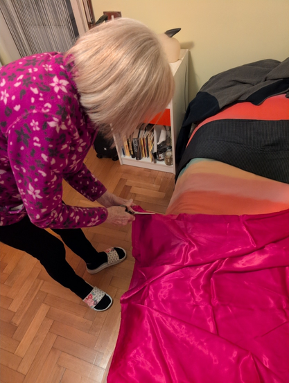 Nonna D cutting the cape.