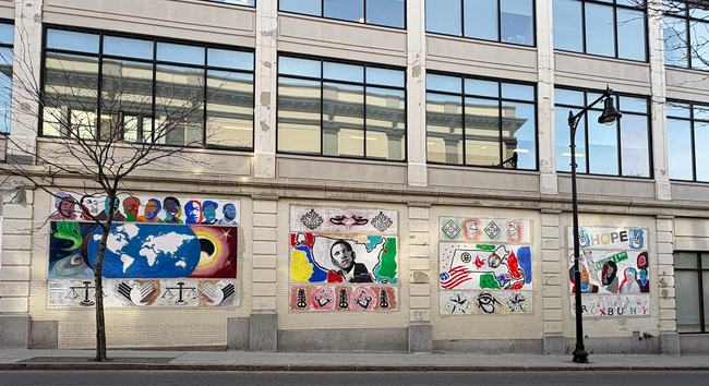 Colorful mural from Roxbury MA in Boston, USA showing iconography related to peace, justice, black history, accessibility, multiculturalism, accessibility, science, religion, and hope. Oh and Boston sports teams.