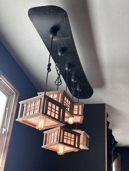 A “chandelier” in Rhythm Summit - Japanese lanterns hung from a snowboard.
