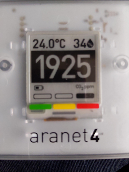 An Aranet 4 carbon dioxide meter reads 1925 ppm of CO₂