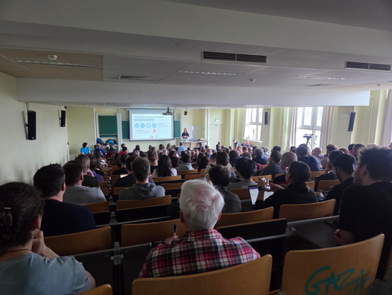 Big room filled with people which is currently very very hot