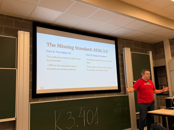 Mike and his slide that says the missing standard, ATAG 2.0, outling part a, editor UI and part b, support authors