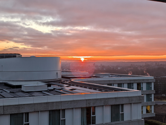 The sun rising on the horizon 