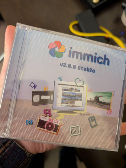 A boxed CD containing software - the immich photo Library.