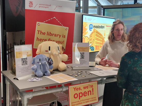 Our booth at the fair, featuring two plushtodons