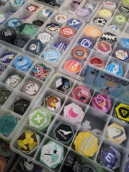 The brand new pink lychee sticker amidst boxes of vast colourful hex stickers