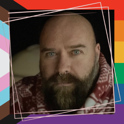 Image shows Rob, looking devilishly handsome with fancy rainbow border around his picture. 
