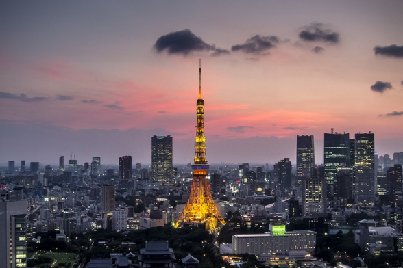View of the Tokyo tower at sunset from an observatory.