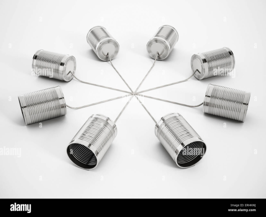 8 metal cans in a circle connected from the center by string.