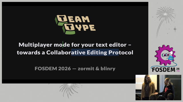 Capture from our FOSDEM talk. You can see the title slide, and two white people presenting it.