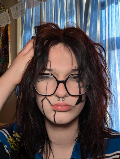 Okay yeah I don't know what I was doing with this one but I have some kind of like cyberpunky makeup look. I do look good though