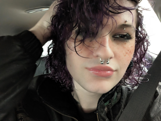 A girl with wet hair looking at the camera