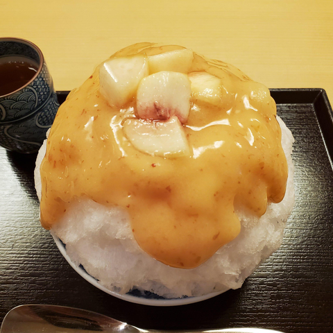 Fresh peach kakigori (shaved ice).