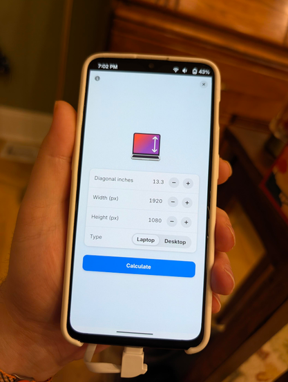 A phone running Dippi, which is a display DPI/aspect ratio calculator. The screen shows the inputs for a 13.3" diagonal laptop display with a resolution of 1920×1080.