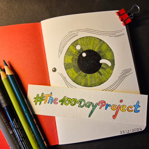 Foto: Skizzenbuchseite, Zeichnung eines Stilisierten Auges. Fineliner und Buntstifte, schwarz und grün. Tag mit dem Hashtag #the100dayproject. 