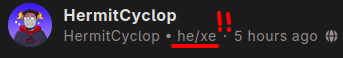 Top of a post made by user HermitCyclop. Inline, next to the handle, the user's pronouns (he/xe) are displayed. This is underlined in red with two red exclamation points next to it because it's very cool.