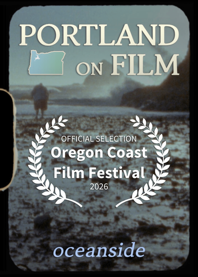 A vertical poster displays a beach-at-sunset backdrop with giant rock formations in the distant ocean, as a man uses a metal detector on the rocky ground and large lettering over the entire poster that reads, "PORTLAND ON FILM | oceanside," and a film festival laurel that reads, "OFFICIAL SELECTION | Oregon Coast Film Festival 2026."