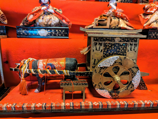 Miniature ox and cart.