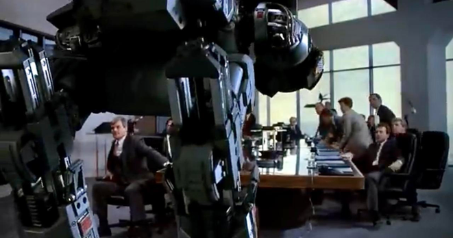 The ED-209 testing at the board meeting scene from 1987 Robocop. 

source https://youtube.com/watch?v=TYsulVXpgYg