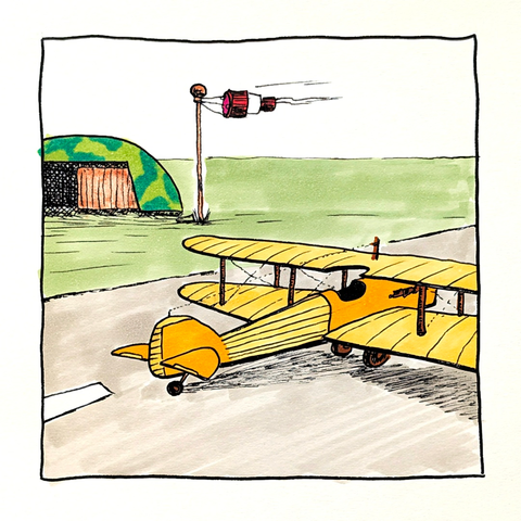 Gelbes Doppeldeckerflugzeug auf einem Rollfeld