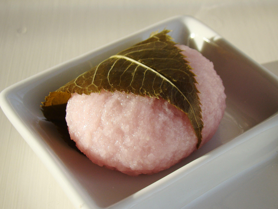 Sakuramochi, a sticky rice cake wrapped in a 'pickled' cherry tree leaf.