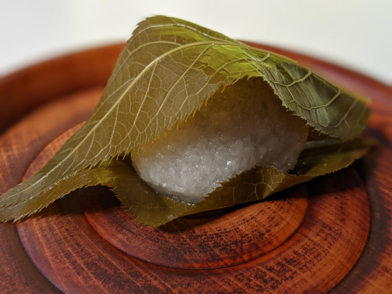 Sakuramochi, a sticky rice cake wrapped in a 'pickled' cherry tree leaf.