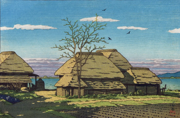 A traditional style farm in Ibaraki Prefecture. In the foreground, a vegetable field has been planted in tidy rows. Nearby, a tall tree is still leafless. Beyond, a group of thatched-roof farm buildings stands on the shore of what is probably Lake Kasumigaura; on the left, a single person can be seen in shadow, occupied with an unseen task. Above, a trio of birds wheel in a bright blue sky populated by a few puffy white clouds. The sun illuminates the scene at an angle, casting the shadows of unseen trees across the farmyard.