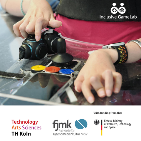 A promo image consisting of the following elements: There's a photo showing a close-up of two hands, one resting on a transparent plastic table, the other on an assitive controller, the Byowave Proteus. On the table, there is also a Smpartphone and three colourful buttons. In the upper right corner of the image is the logo of our project inclusive game lab, at the bottom are the logos of the University of Applied Sciences Cologne, the Department for Youth Media Culture, and the Ministry, depicted on a white background.