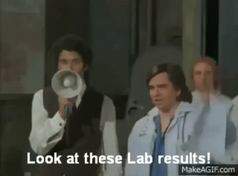 Gif from Darkplace. 

Richard Ayoade shouts throw a megaphone "Look at these Lab Results!" and Matt Berry points at a clipboard with the words "potential  killer" written on it