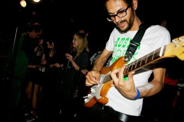 Me playing guitar at a gig. Picture by Ulrike Biets.