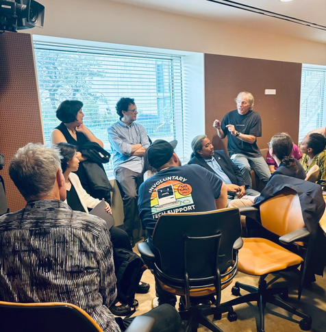Small group discussion in the capacity-building room.
