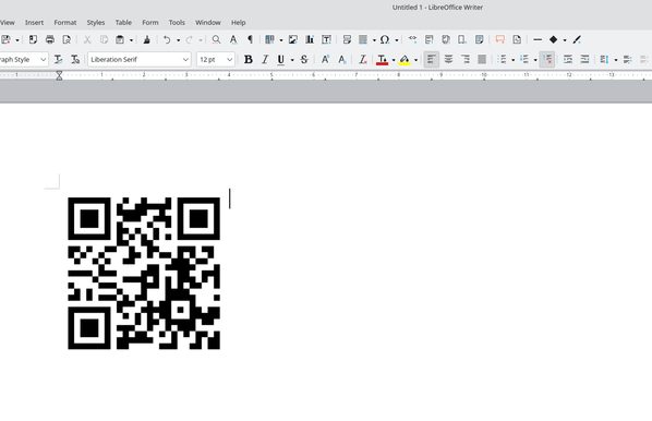 Libreoffice writer with a QR code in an open document. The QR code if scanned has the url for SOURCE magazine. 