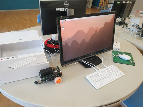 A new Raspberry Pi 500 set up for the first time alongside a Trilobot robot
