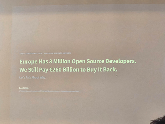 Slide on main screen that states "europe has 3 million open source devs. We still pay 260 billion to buy it back."