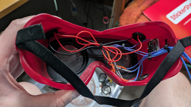 Some shambolicaly lashed-together wiring inside some cheap plastic welding goggles