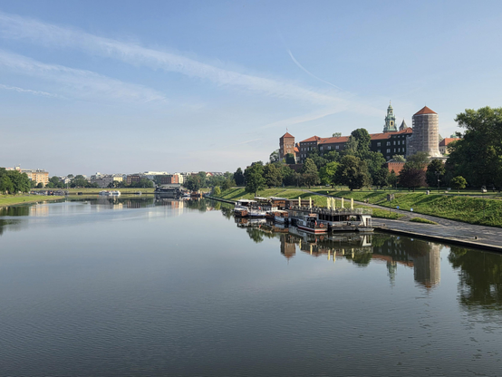 The Wawel caste reflecting across the Vistula river. 