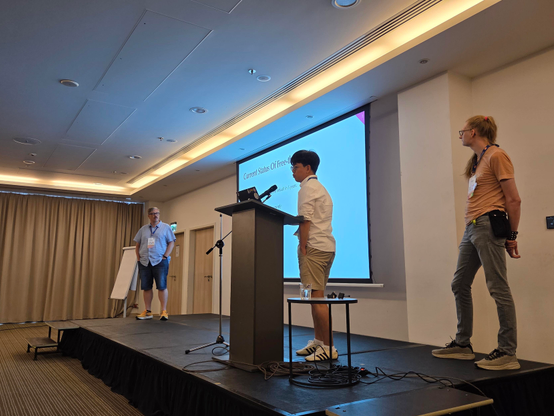 Tobias, Donghee and Fridtjof presenting. 