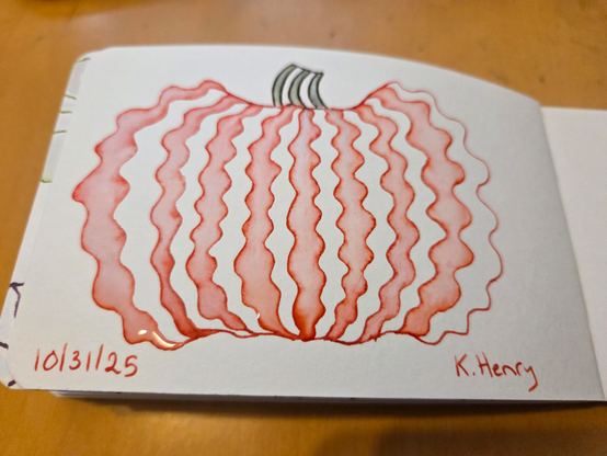 Hand drawn generative/procedural art in ink on an open page of my sketchbook. The abstract pattern looks a bit like a wavy pumpkin with a short stem.