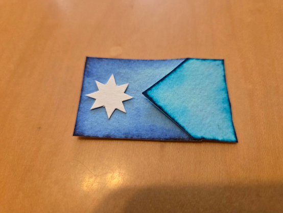 Hand drawn Minnesota flag in ink on watercolor paper.
