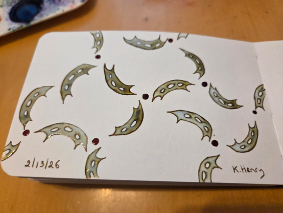 Hand drawn generative/procedural art in ink on an open page of my sketchbook. The abstract pattern looks a bit like a network diagram, but with Klingon Batleths as the edges.