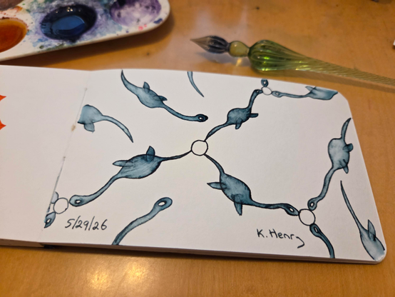 Hand drawn generative/procedural art in ink on an open page of my sketchbook. The abstract pattern looks a bit like a chemistry diagram, but with plesiosaur shapes making the edge lines.