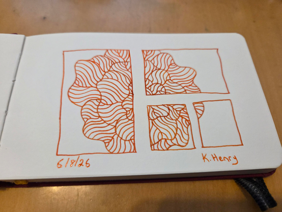 Hand drawn generative/procedural art in ink on an open page of my sketchbook. The abstract pattern looks a bit like looking through a small cluster of windows, an you can see some of a flower through them.