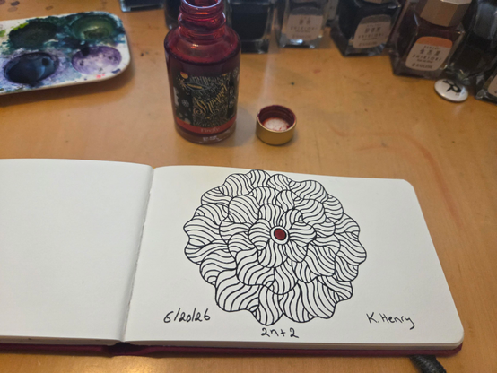 Hand drawn generative/procedural art in ink on an open page of my sketchbook. The abstract pattern is floral. There is an open bottle of shimmer-orange ink next to my sketchbook.