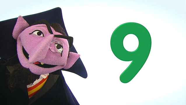 Count hon Count smiles widely beside the number 9