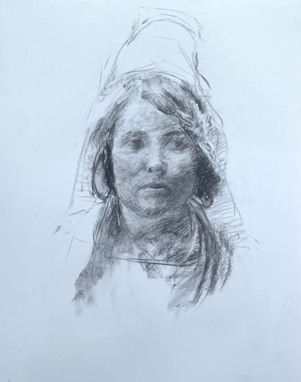Charcoal drawing of the face of a young woman. It’s very haphazardly drawn and the hair doesn’t really look like hair. It’s supposed to be braided.